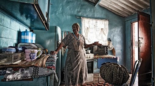 A Soweto, South Africa, customer of Wonderbag, a heat-retention device that continues to cook food after it's removed from the stove, saving users water, fuel, and time. 